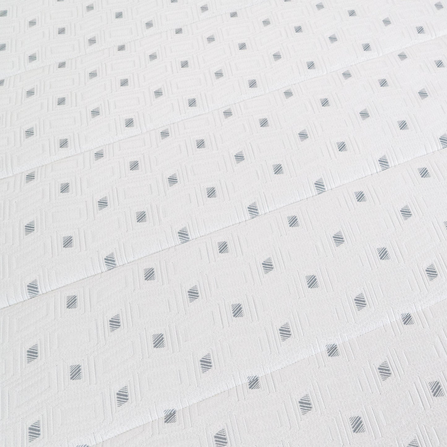 White fabric with a subtle geometric pattern